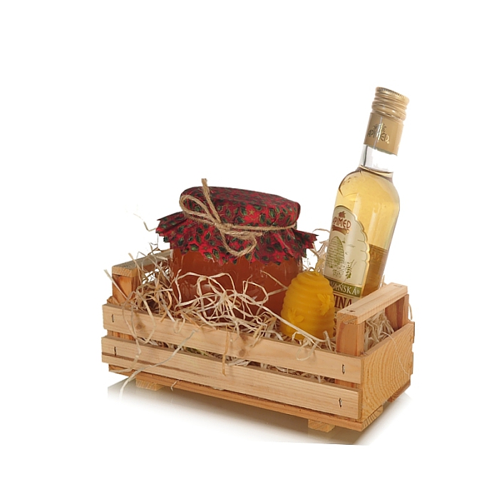 Darčekový set s medom a medovinou v drevenej prepravke.
